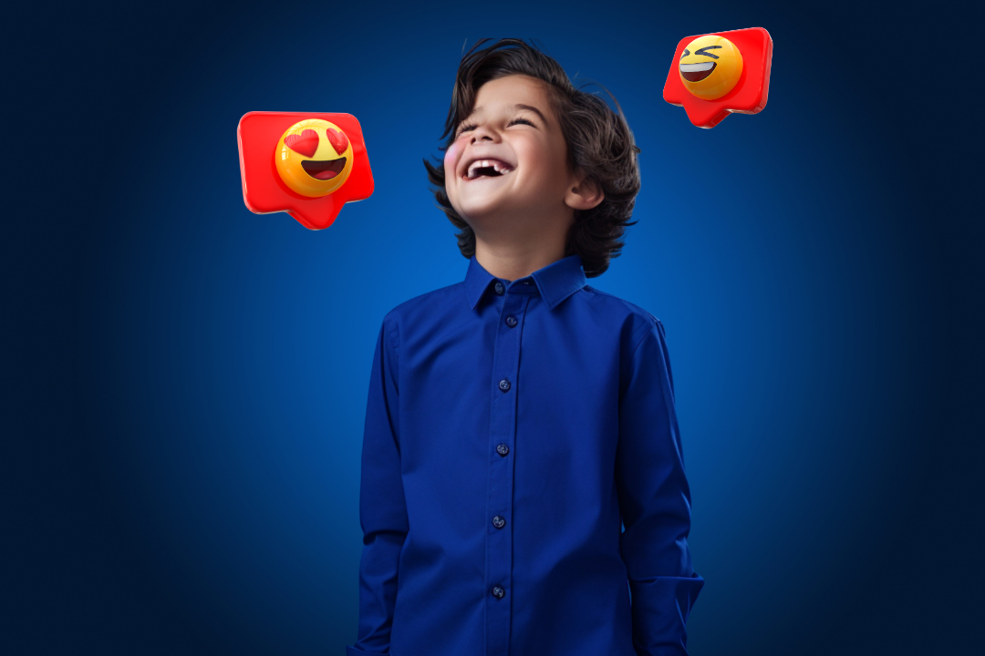 Menino feliz com emojis em volta. Como o inglês no Kidsa mudou a vida de mais de 10 mil crianças? Foto/Reprodução: Freepik.